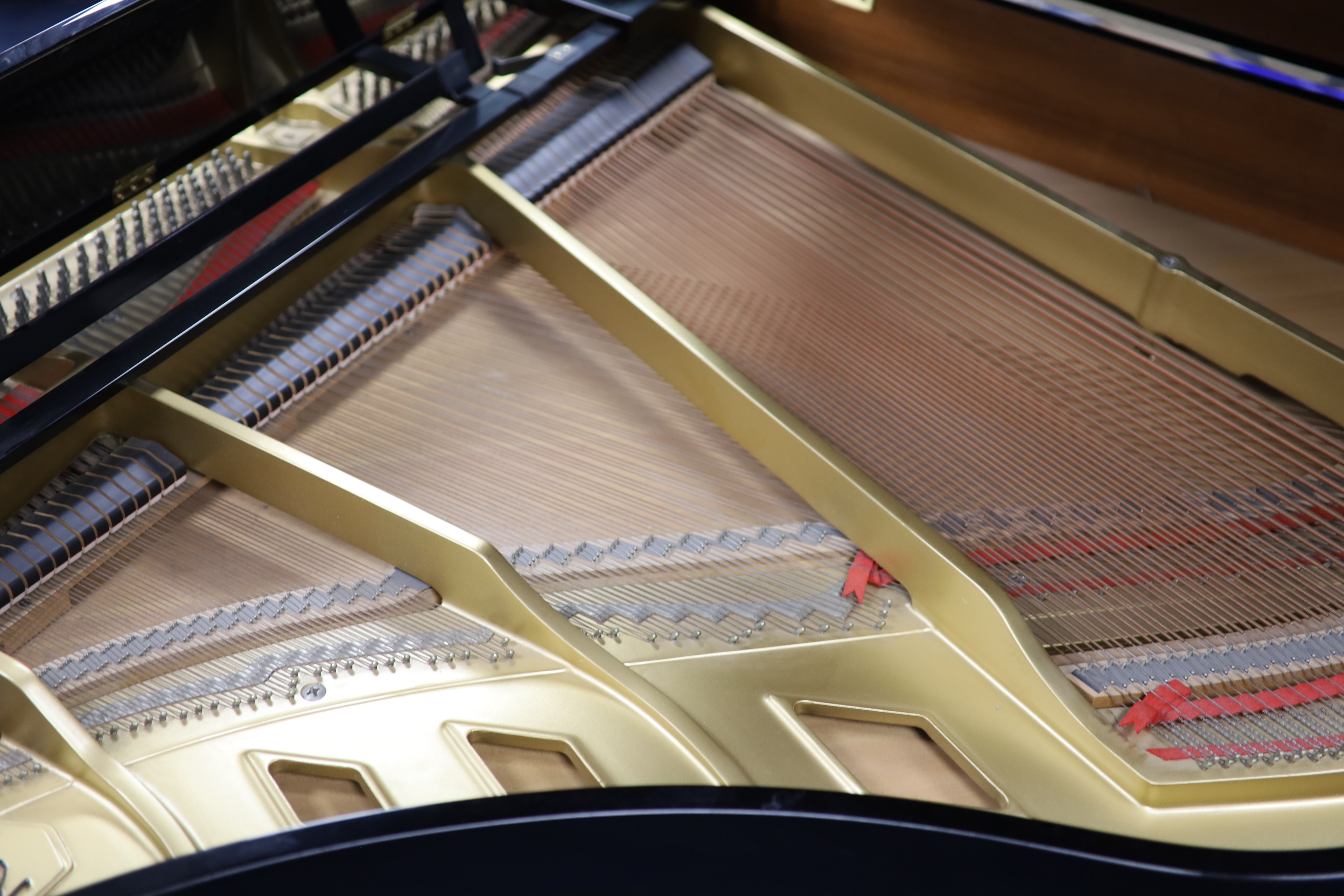 A Steinway & Sons Boston 156 ebonised boudoir grand piano H 102cm. W 146cm. D 150cm.